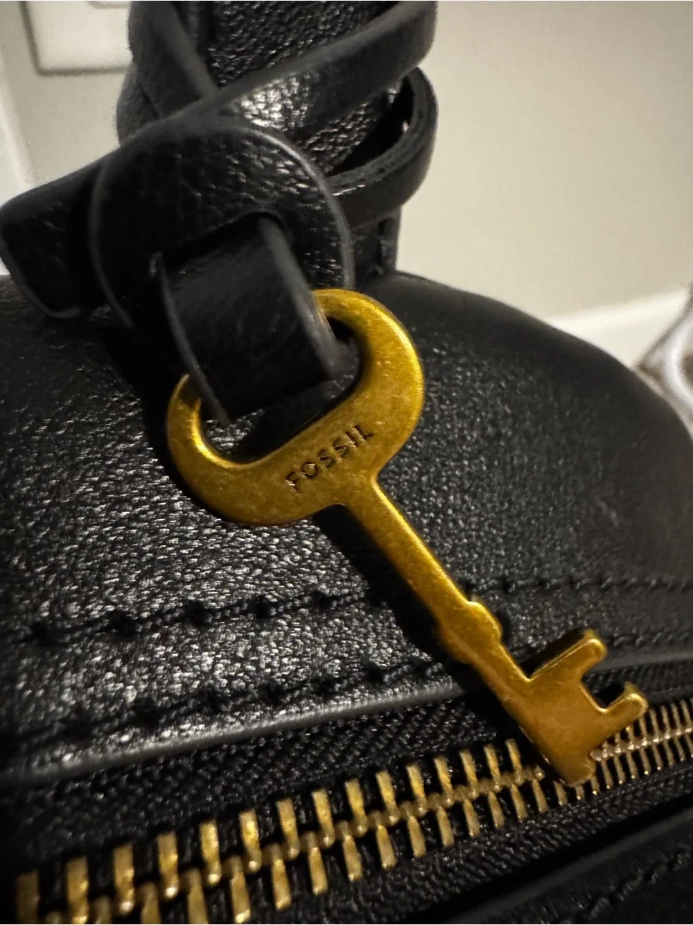Fossil Black Leather Backpack with Gold Zip Accent